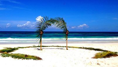 Tulum beach palm leaf arbor